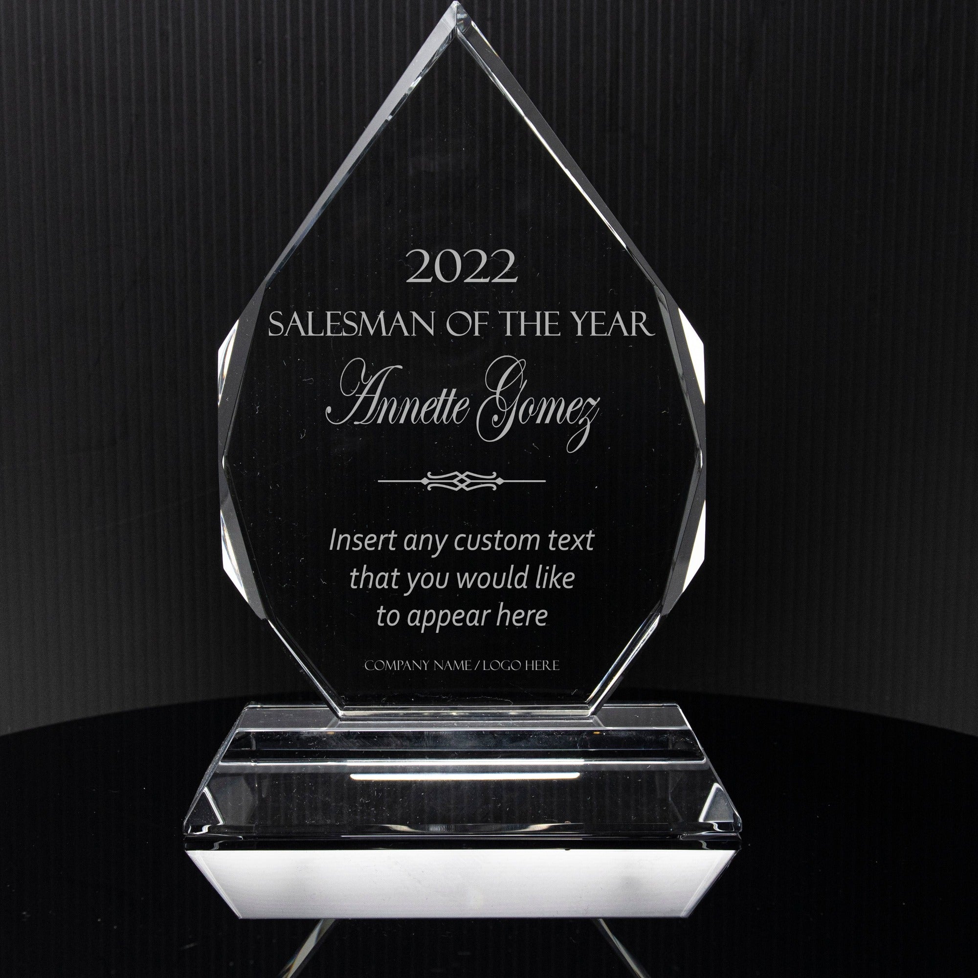 The 7" Diamond Crystal on Clear Pedestal Base Award is shown with a 'Salesman of the Year' engraving.